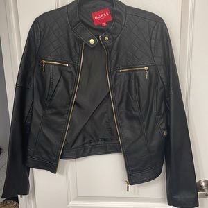 Black Guess leather jacket with accent in the zippers